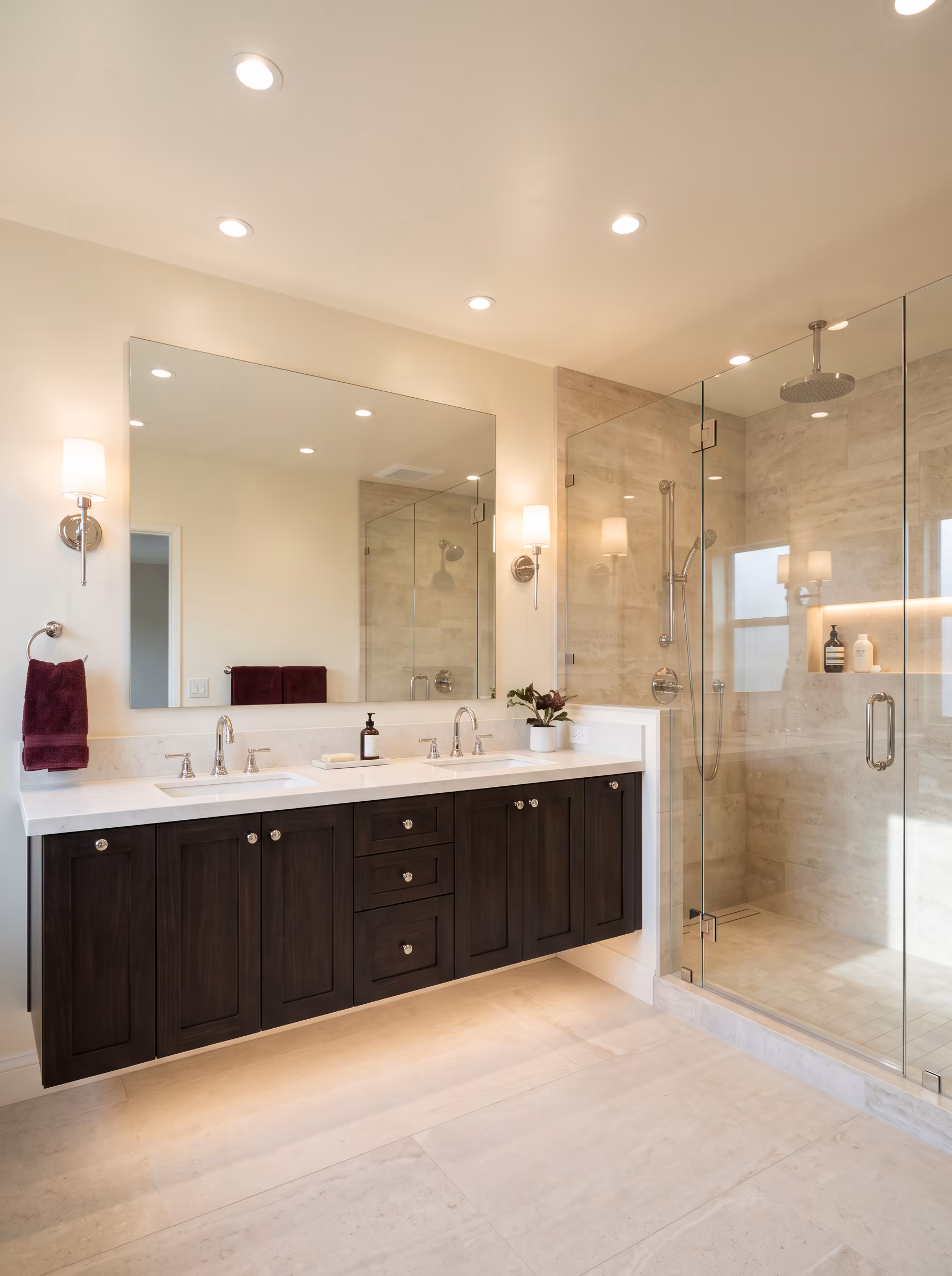 Finished bathroom showing ceiling fixtures and switched lighting coordinated with the room layout