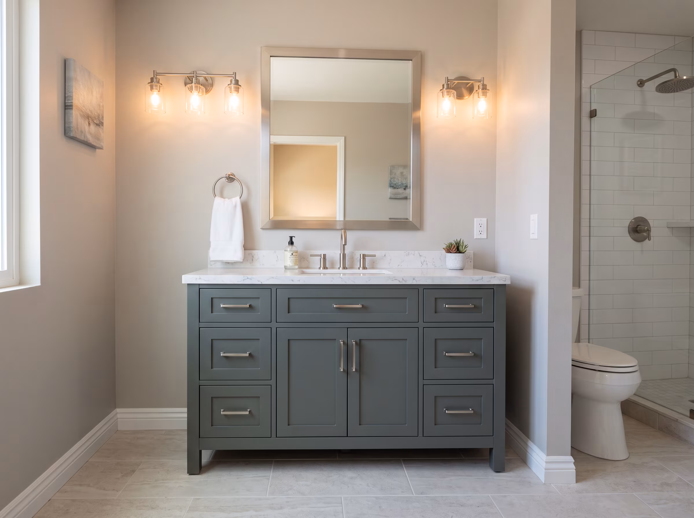 Freestanding vanity in the same wall position with matching plumbing