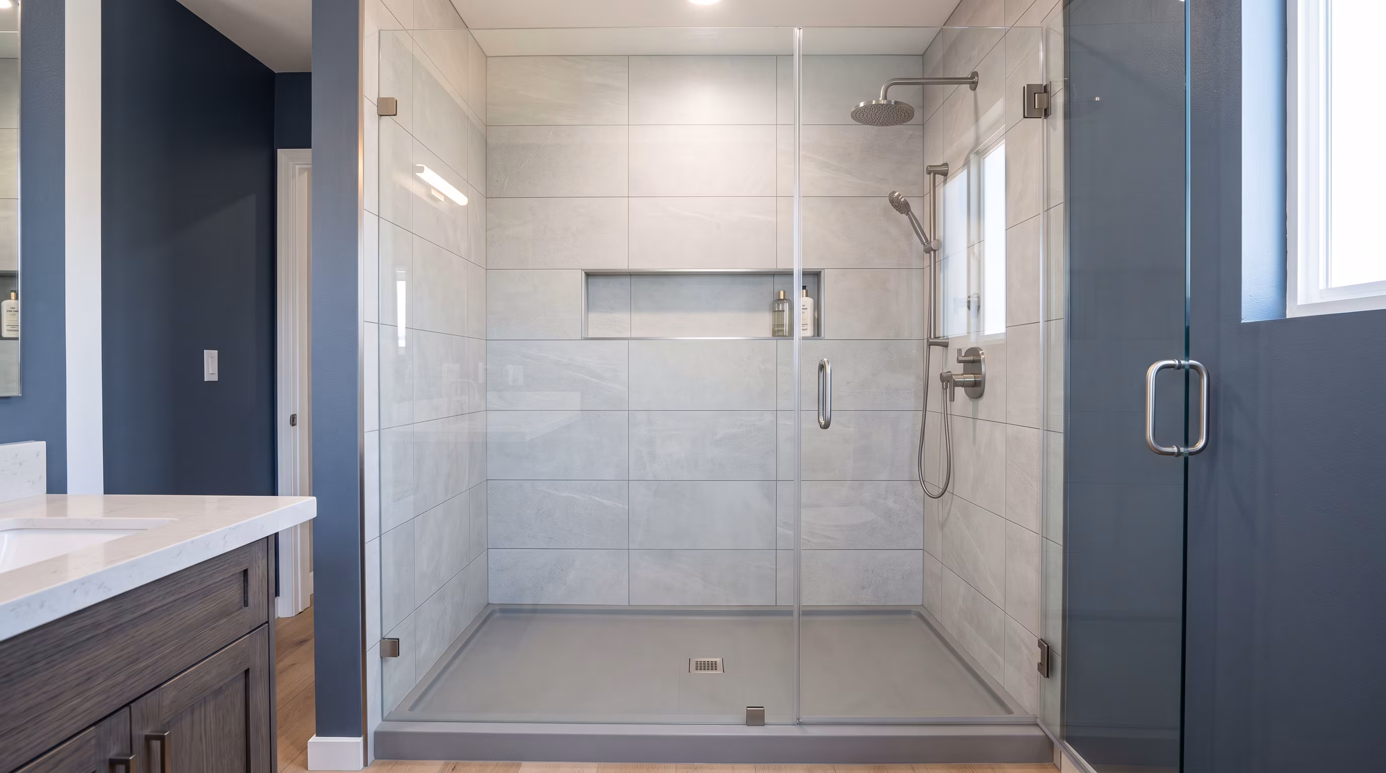 Sleek modern shower with glass door in a contemporary bathroom