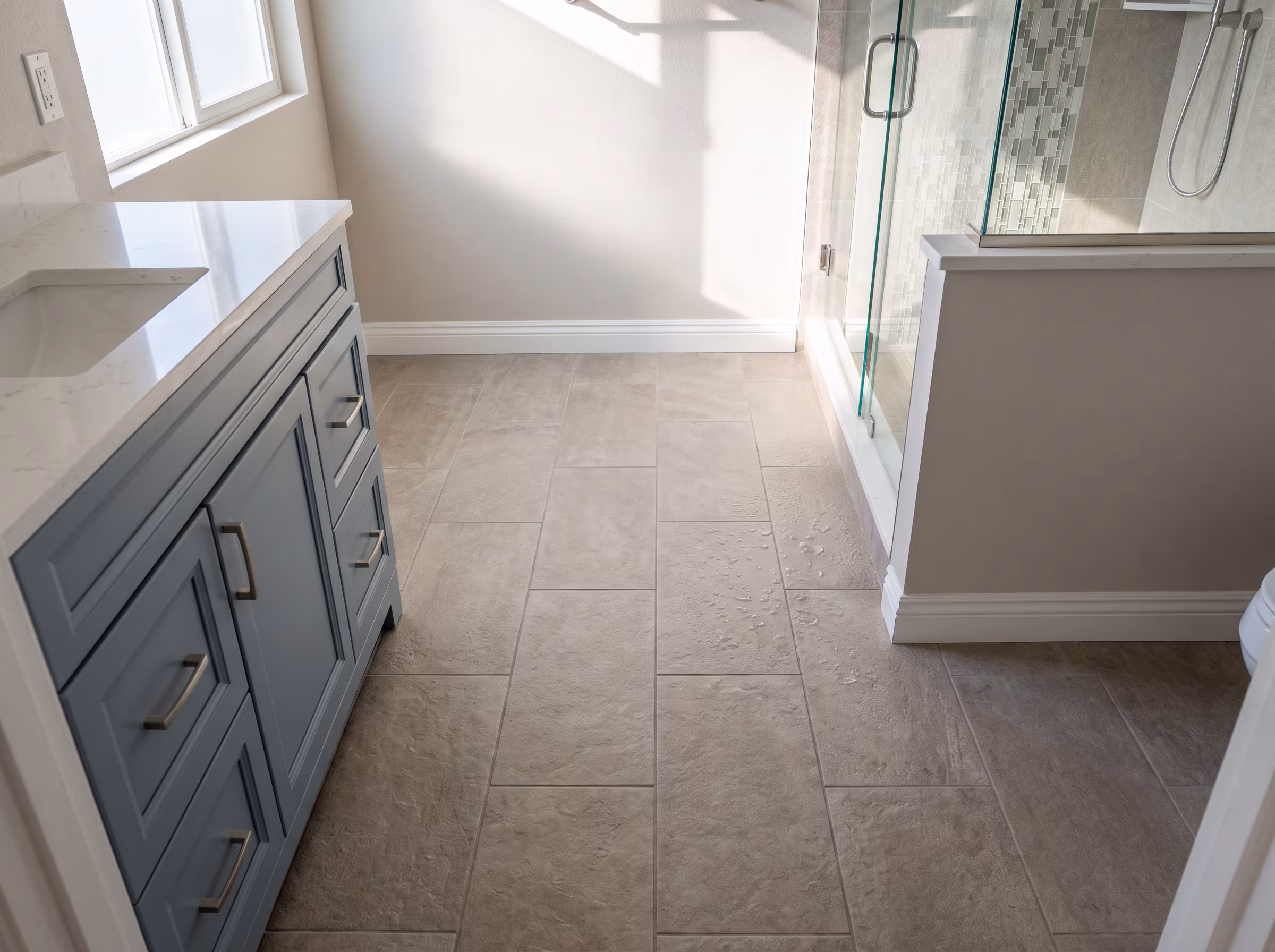 Ceramic tile shower surround in a contemporary bathroom